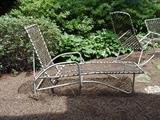 Lounger with Woven straps on metal frame