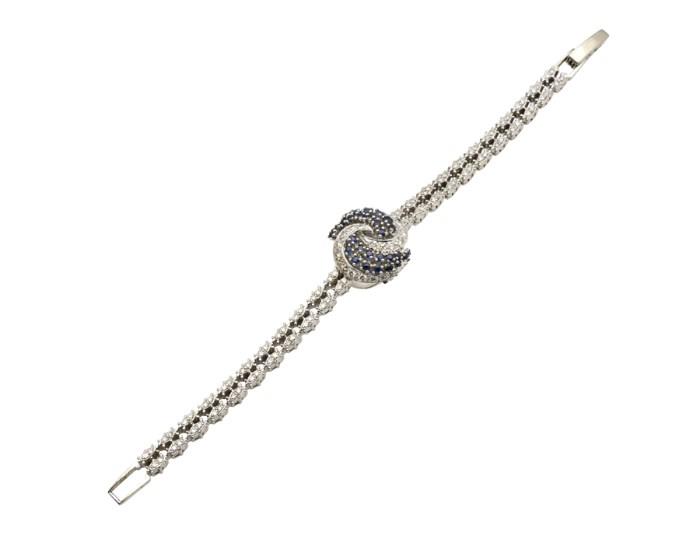 Lot 26: A LADIES DIAMOND AND SAPPHIRE LONGINES WATCH WITH COVER