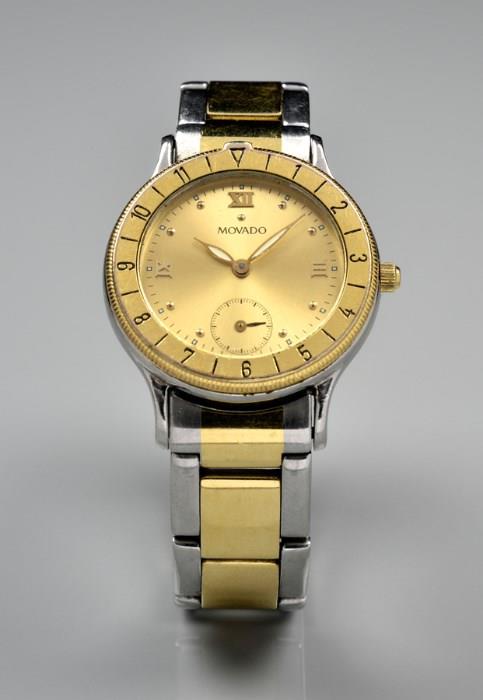 Lot 48: A LADIES MOVADO WATCH WITH GOLD FACE