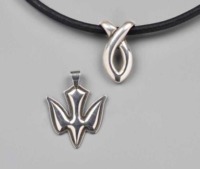 Lot 51: A JAMES AVERY ICHTHUS ON CORD WITH ADDITIONAL DOVE PENDANT