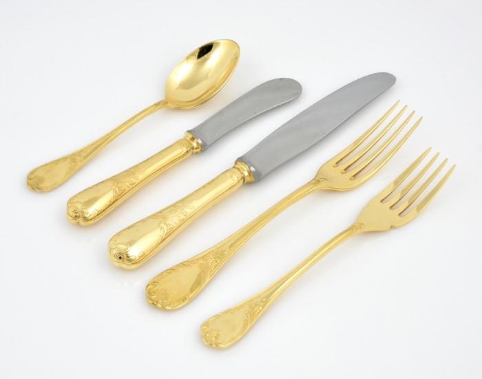 Lot 67: A CHRISTOFLE GOLD-PLATED FLATWARE SERVICE FOR TWELVE