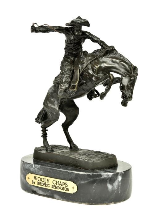 Lot 88: AFTER FREDERIC REMINGTON, (American, 1861-1909), Wooly Chaps, Cast bronze, ed. 6/75, H 9¾ x W 7½ x D 4½ inches.