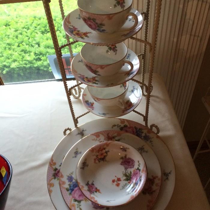 more cups & saucers with a rack