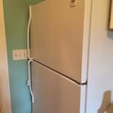         White Whirlpool refrigerator