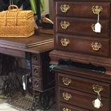 Antique Singer sewing machine cabinet; 2 matching night stands