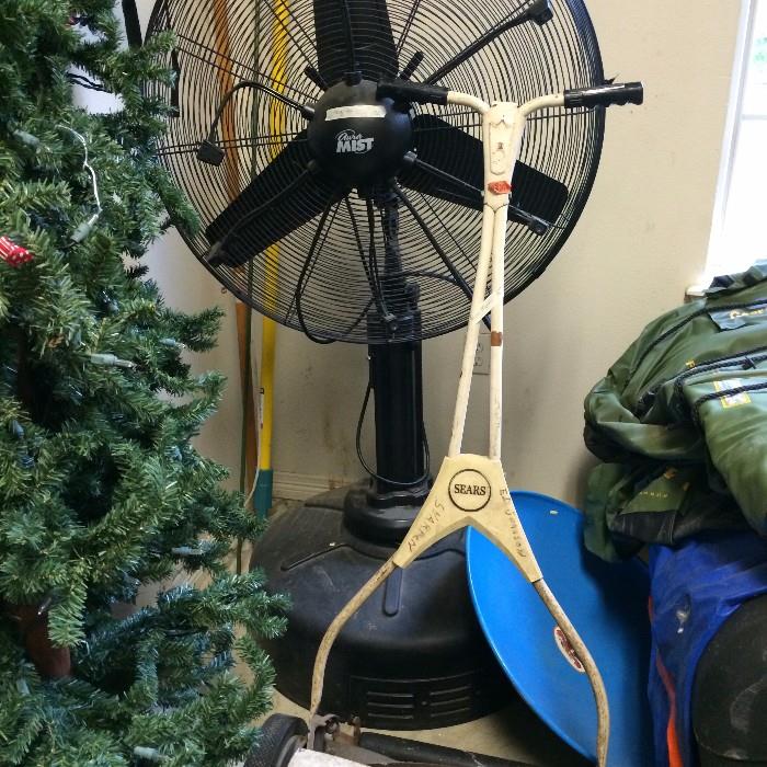 Christmas trees; large floor fan; Sears push mower