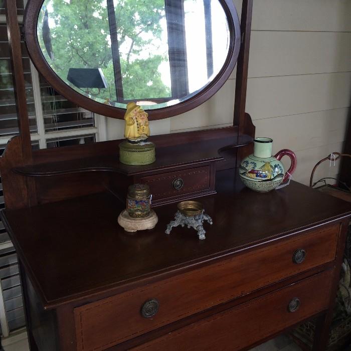 Darling two-drawer antique dresser with beveled mirror