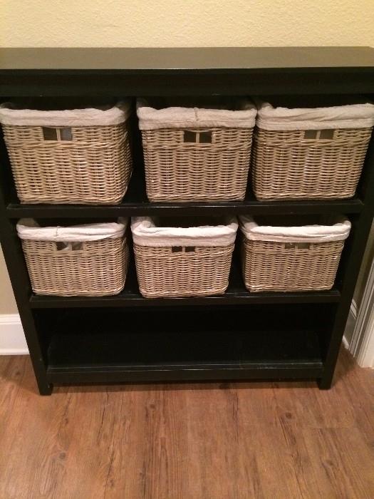       Three shelf unit with six baskets 