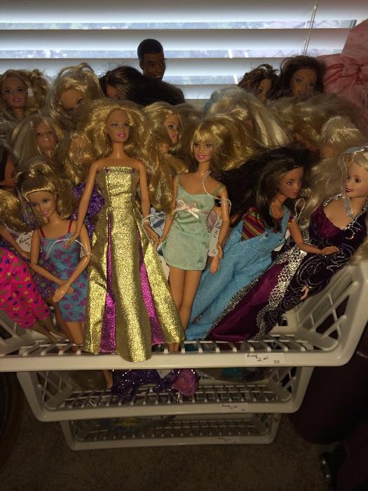     Many Barbie dolls (and accessories)