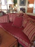           The other red sofa; decorative pillows