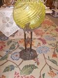 Vaseline glass bowl and art deco cast metal stand