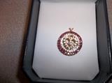 Ruby and diamond pendant.  (Item not kept on property.  Shown by appointment only)
