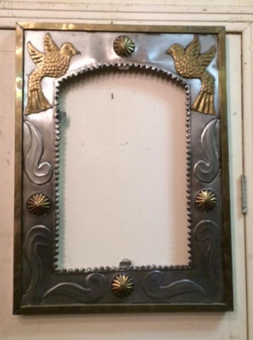 tin mirrors in different designs and sizes