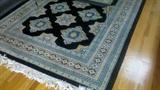 All rugs are handknotted. Priced to sell.