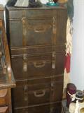Believe it or not this is a leather front actual file cabinet.
