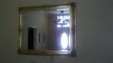 Very large mirror in gold frame. This picture doesn't nearly do it justice.