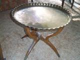 Brass tray over wood base