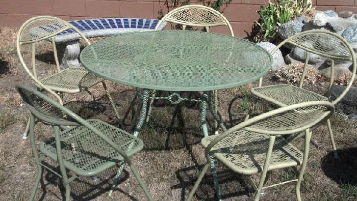1950s folding patio set. Both table and chairs fold.