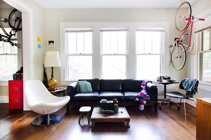 white bucket chair record player eames chair sofa couch coffee table