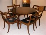 It comes with six chairs, the table and 4 leaves! Plus it has custom pads for the top. This set is in mint condition.