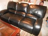 Reclining leather sofa