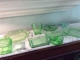 Beautiful collection of green depression glass. The beauty of these pieces is that they can be springy and summery as well as wintery when mixed with holiday reds!