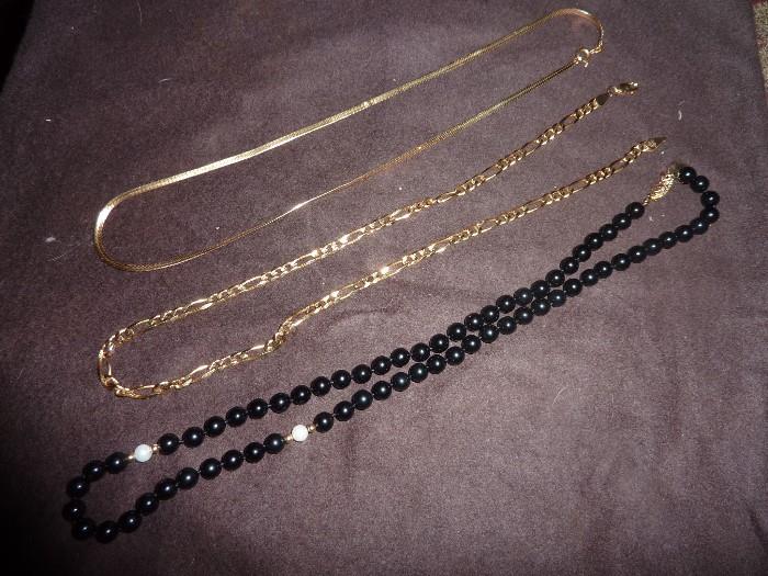 14K Gold chains (2) gold and onyx necklace
