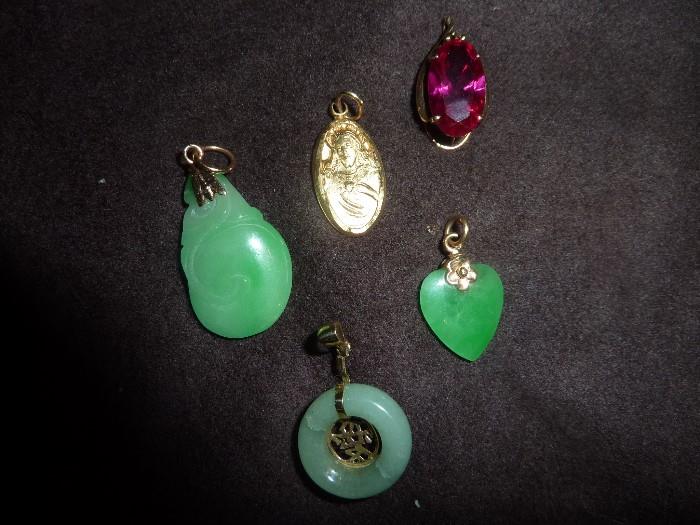 jade and gold pendants