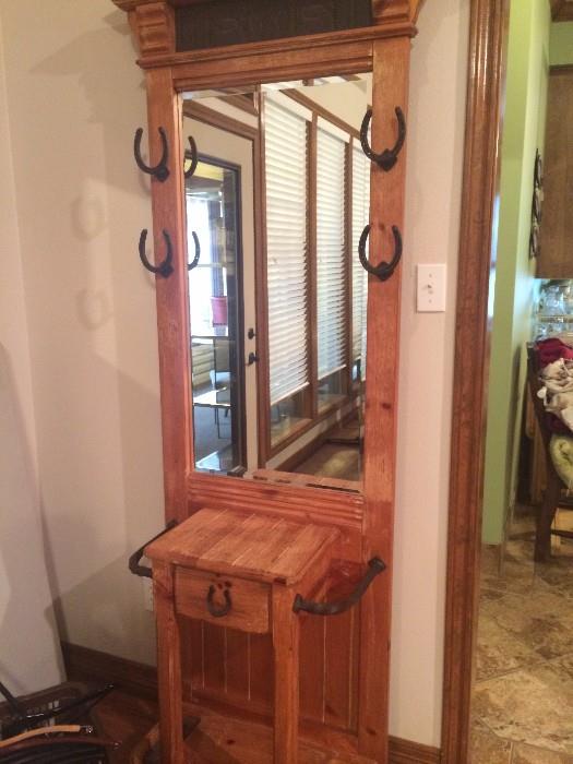   Rustic mirrored hall tree with horseshoe "hooks"