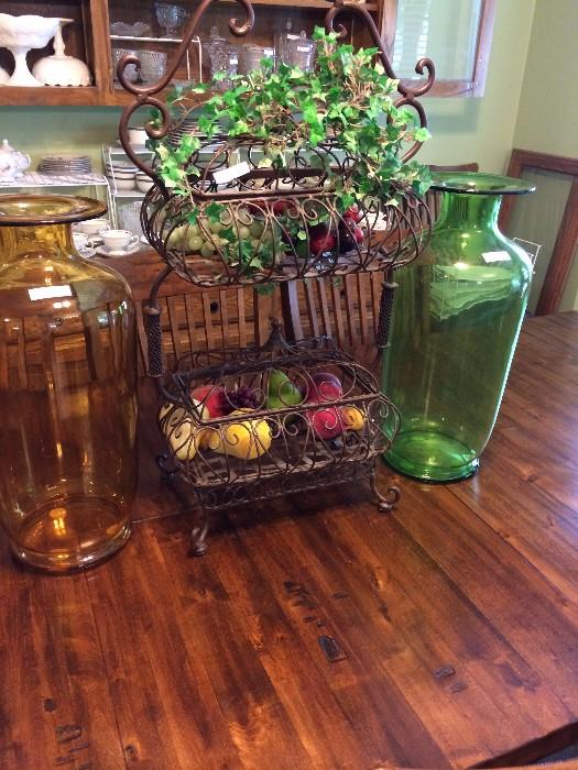 Decorative decor flanked by Tiara glass demijohn vases