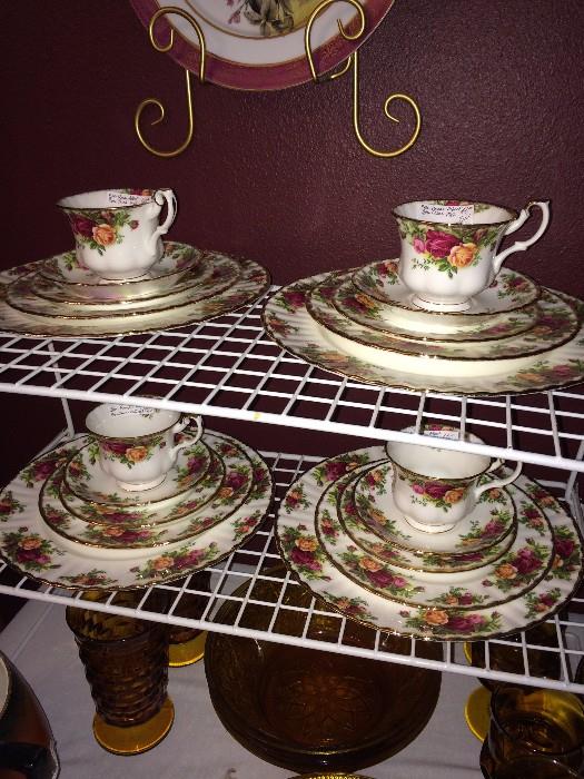 Four place settings of Royal Albert "Old Country Roses" china