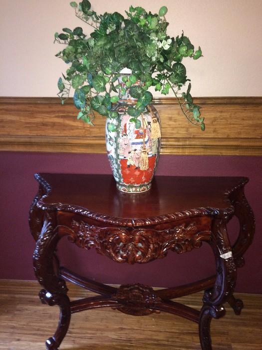         Ornate entry table; Asian vase