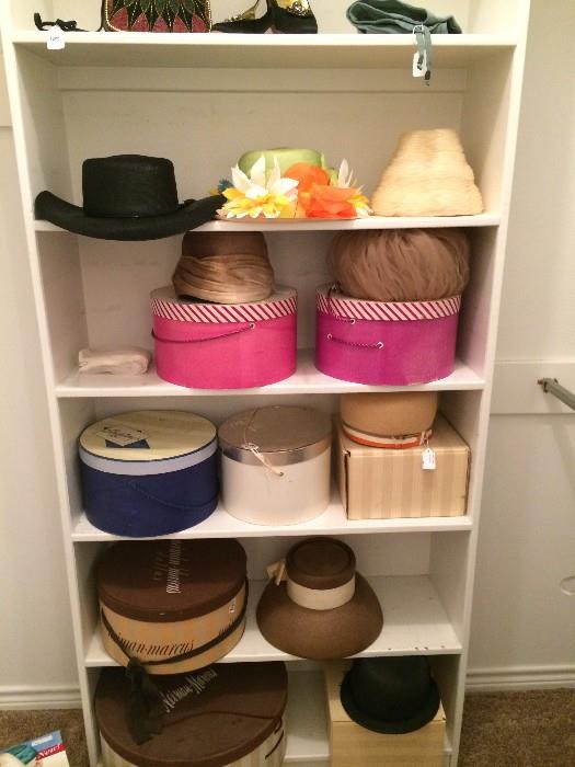         A variety of hats and hat boxes.