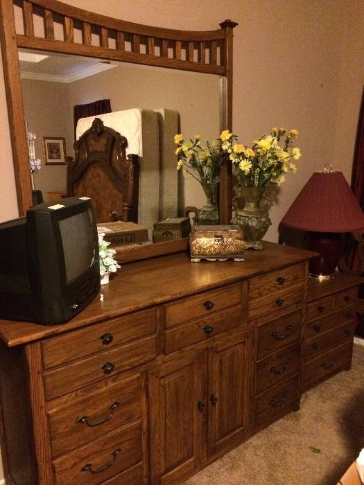 Rustic style dresser has matching armoire & nightstand.