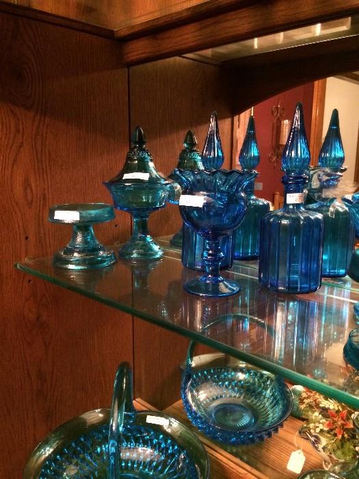    Lots of blue baskets, bowls, & decanters