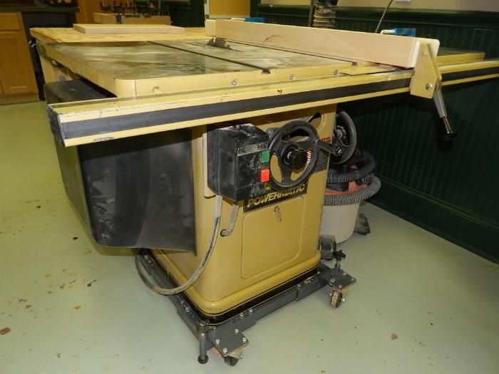 Powermatic 66 cabinet table saw.  Short bed with original equipment T square rip fence.  8 years old in great condition.  Includes base with wheels for portability in the shop.  
