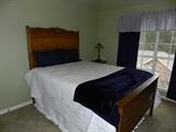 Antique Bed - full size , but can accommodate a queen mattress as it is doing so here!  