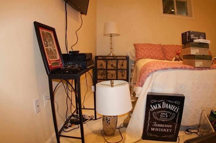 Metal small console, Jack Daniels, King bed, Mercury lamp
