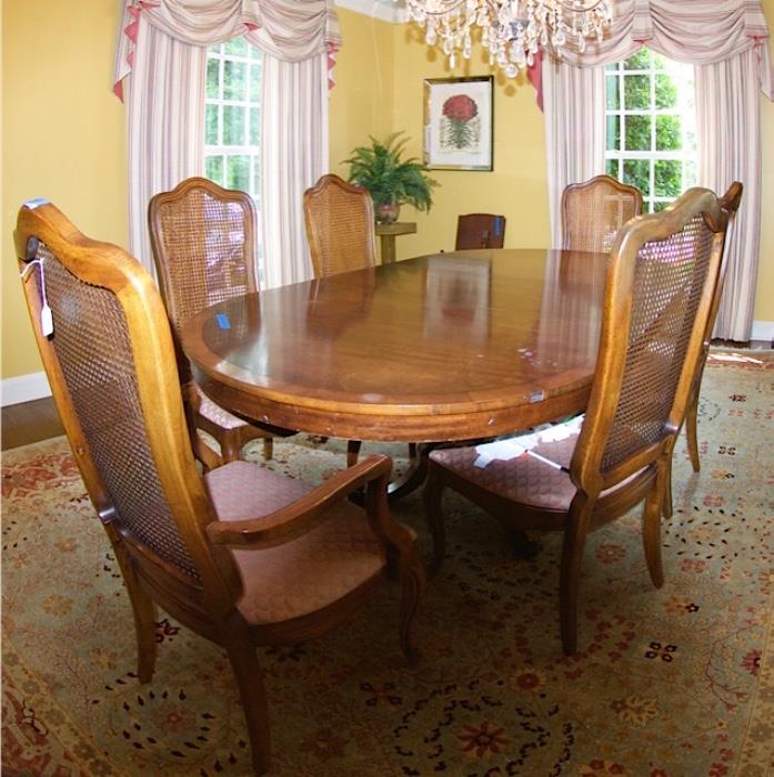 Dining table  w/ pads and chairs