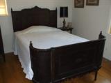 Early 1900's bed w/curved foot board