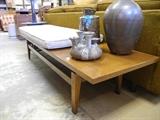 Jens Risom long and low bench or coffee table and vintage Studio Pottery.