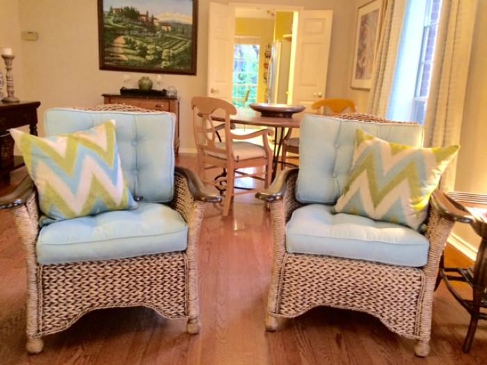 2 Matching Rattan Chairs with Blue Cushions. Throw Pillows Sold Separately