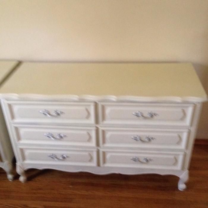 one of two matching chest of drawers
