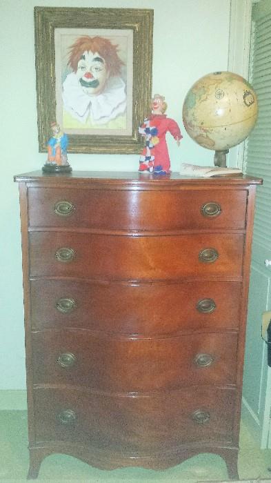 Mahogany chest of drawers, illuminated globe, Clown collection including original painting.