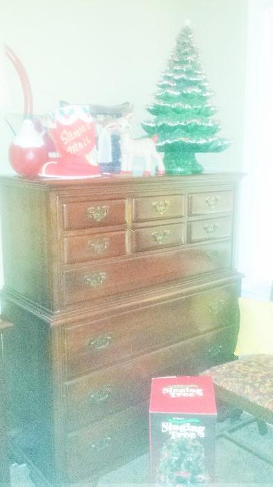 Modern Cherry bedroom suit. Link Taylor Treasure House. Tall chest of drawers. Large ceramic Christmas tree.