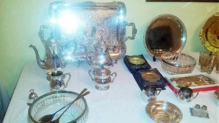 Silver plate Rodgers tea service & many other silver plate pieces. 