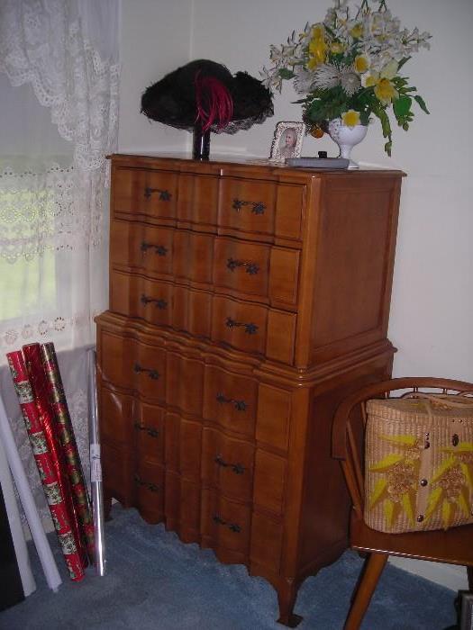 old hat and chest that matches the other bedroom furniture