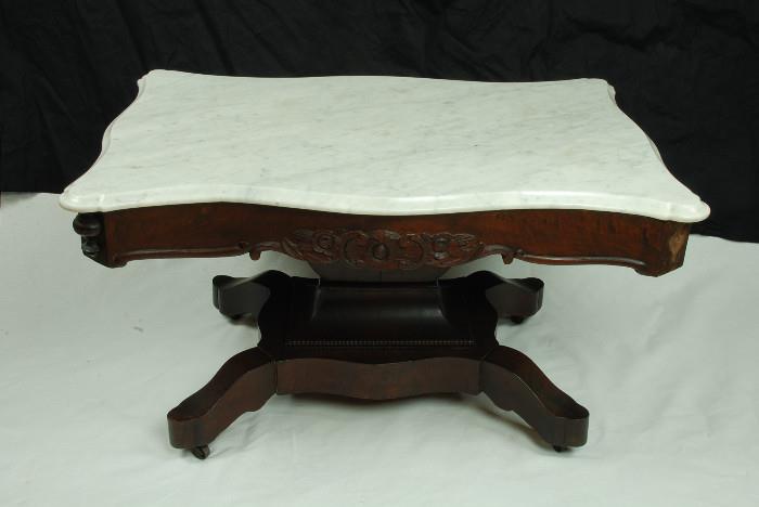 Not much known but circa 1900 - marble top does not have any chips - small brass metal wheels - original finish