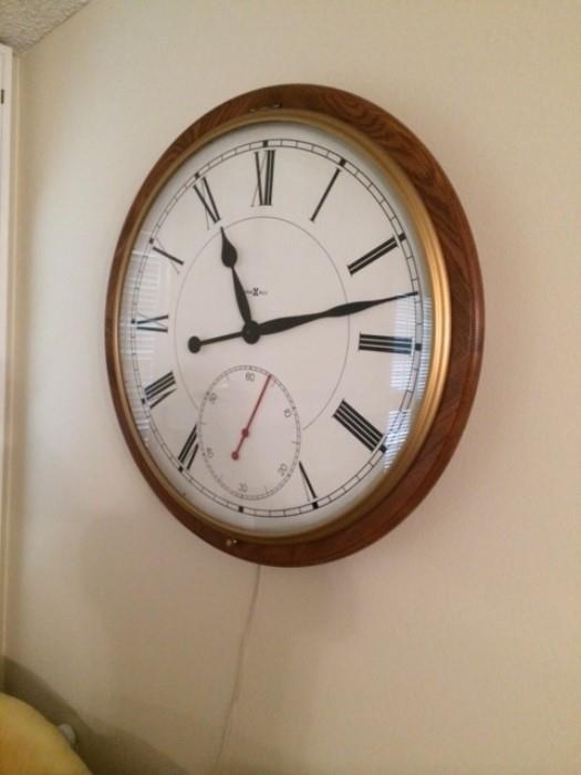 Howard Miller wall clock with new motor.  Approx. 43"