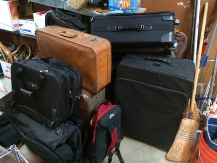 Various luggage, including Briggs and Riley and Tumi